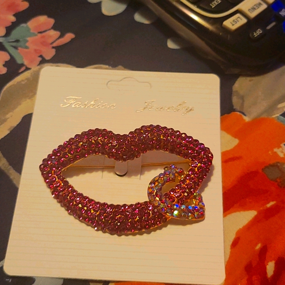 Bling out lip brooch